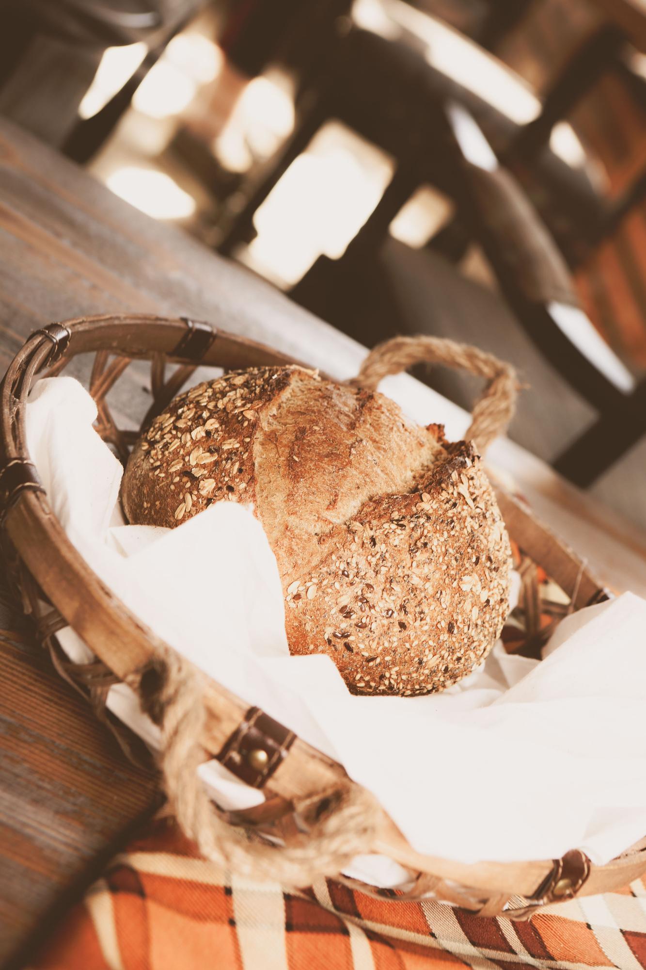 rustic sourdough loaf torn open